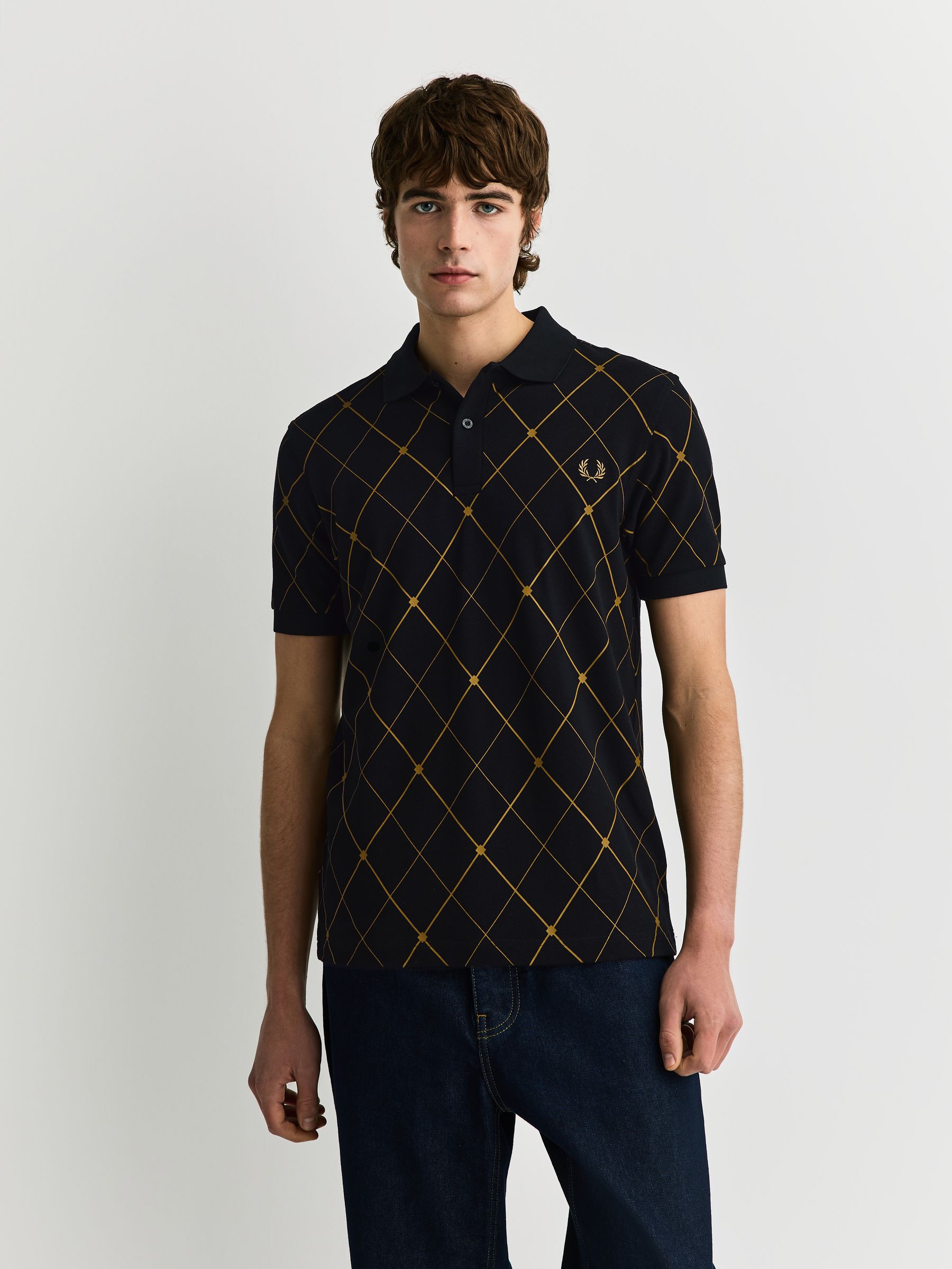 Buy Fred Perry Black Argyle Print Polo Shirt from the Next UK 
