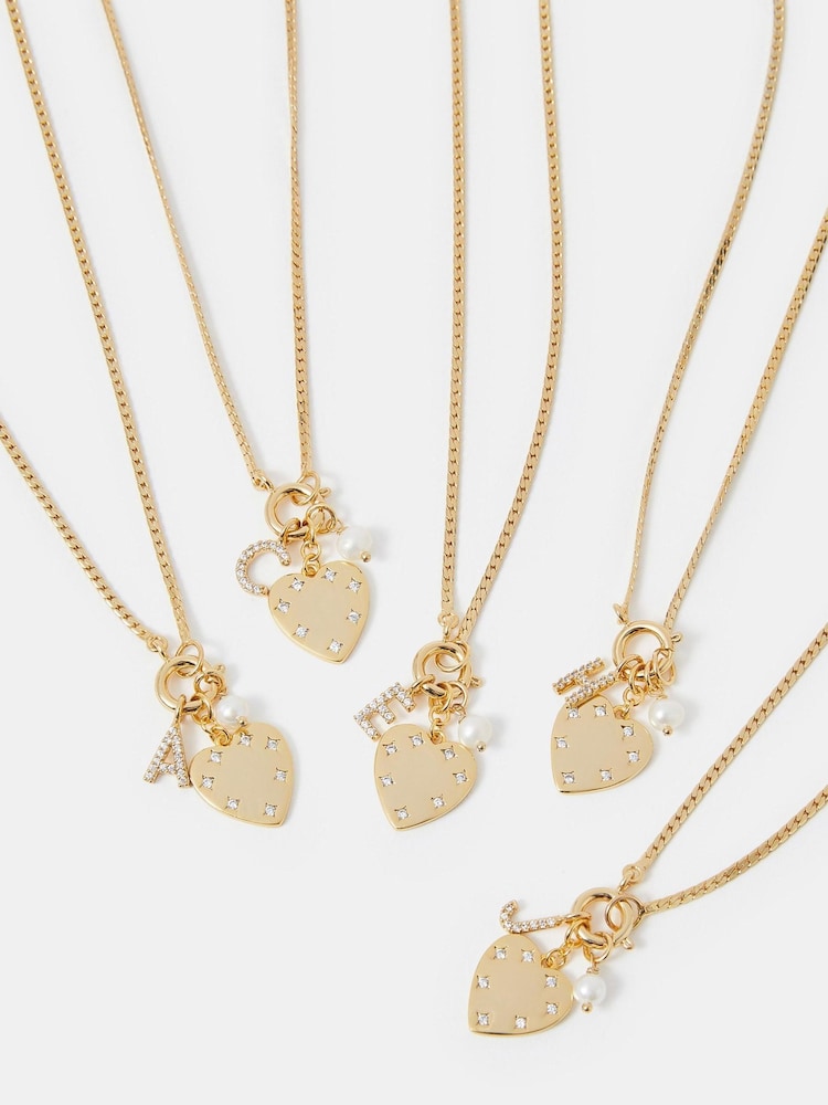 Accessorize Gold 14ct Plated Omega Initial Charm Necklace - Image 3 of 3 Accessorize Gold 14ct Plated Omega Initial Charm Necklace - Image 3 of 3