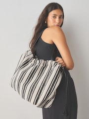 Black/White Drawstring Stripe Shoulder Bag - Image 1 of 9