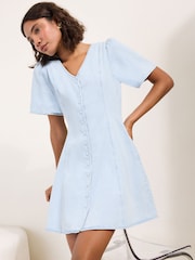Friends Like These Light Wash Petite Angel Sleeve Button Denim Mini Dress - Image 1 of 4