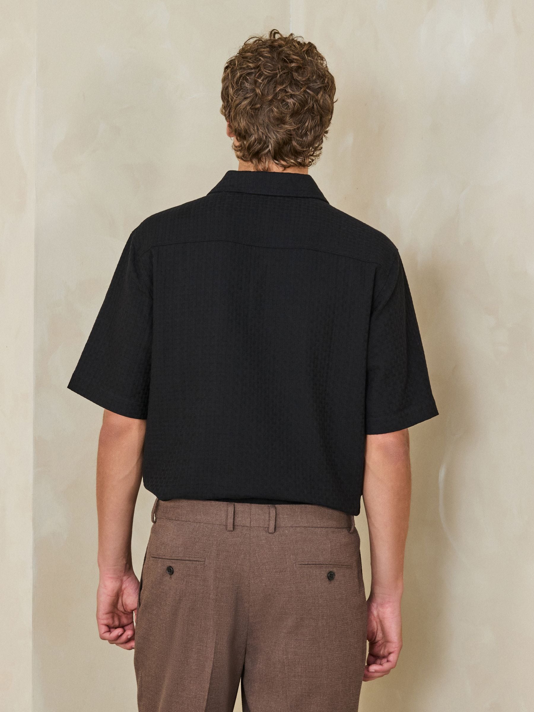 Buy Black Woven Textured Boxy-Fit Polo Shirt from Next USA