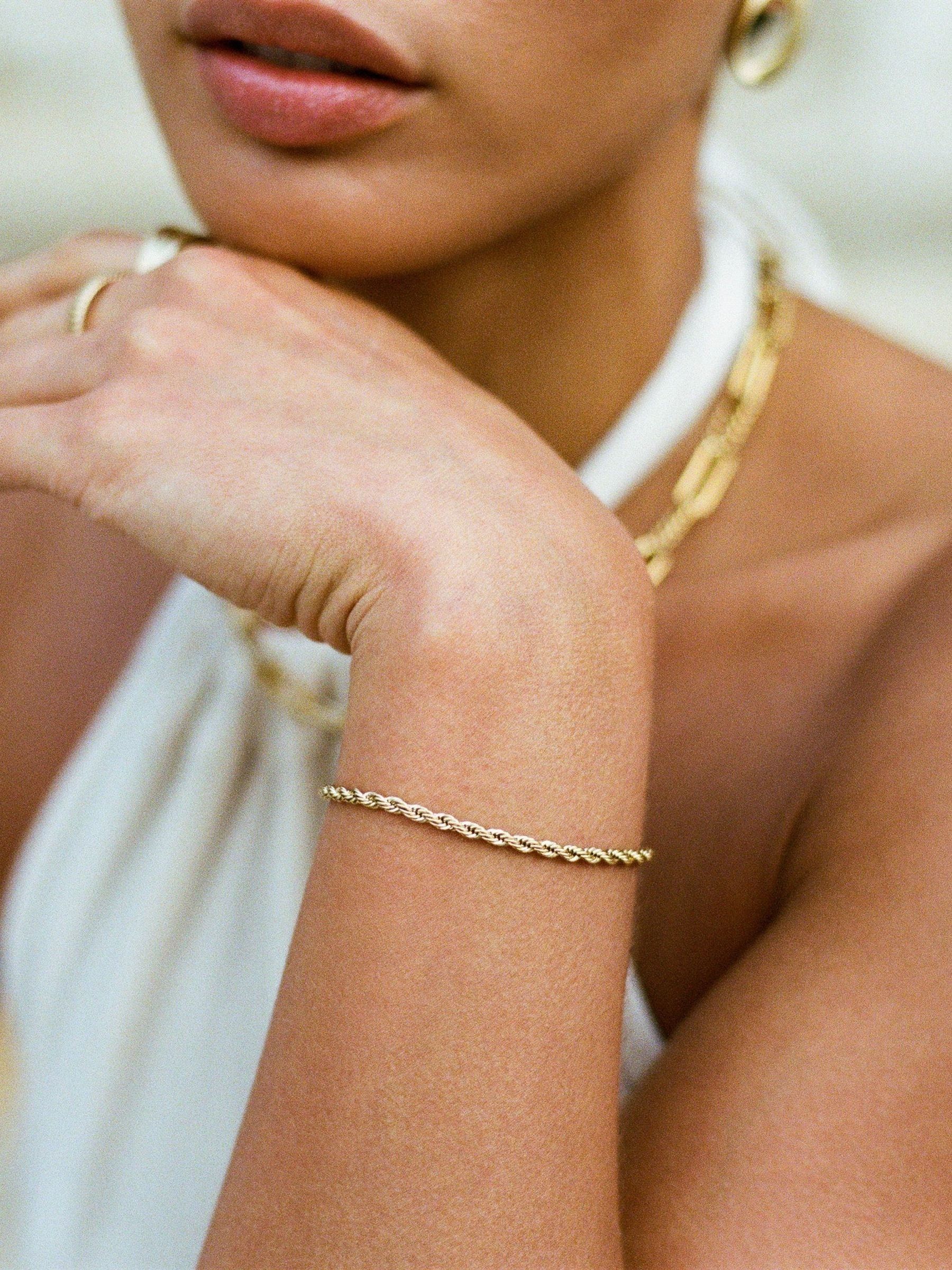 Buy D.LOUISE Gold Tone Waterproof Rope Bracelet from Next Netherlands