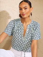 Love & Roses Mint Green Geo Print Sequin Trim V-Neck Short Sleeve Blouse - Image 1 of 4