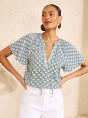 Love & Roses Mint Green Geo Print Sequin Trim V-Neck Short Sleeve Blouse - Image 2 of 4