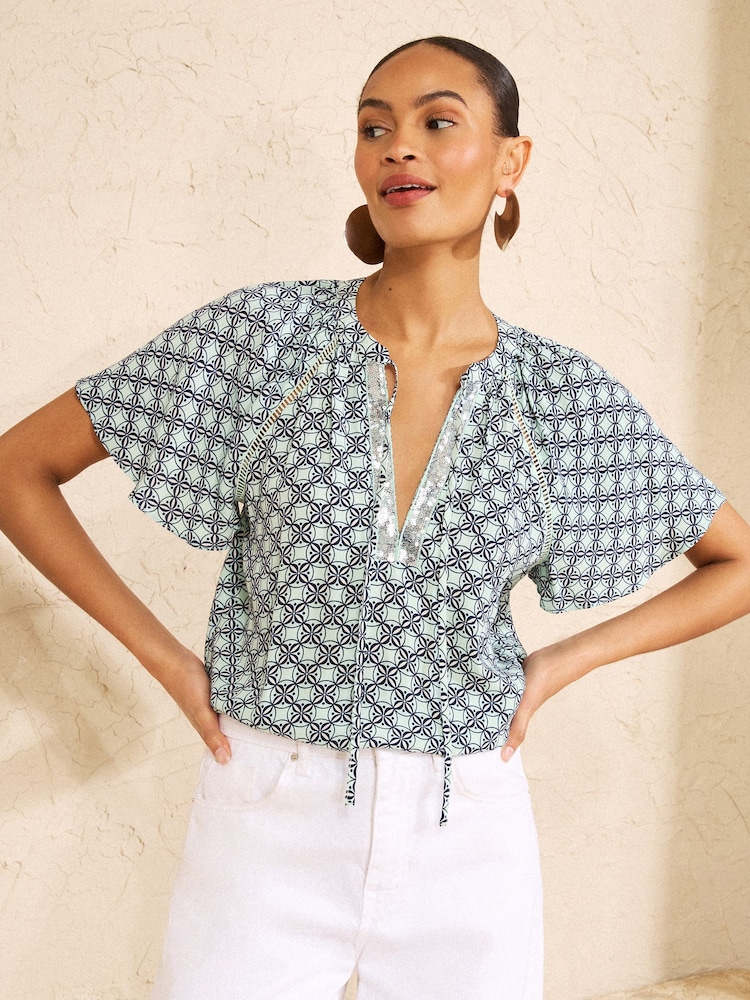 Love & Roses Mint Green Geo Print Sequin Trim V-Neck Short Sleeve Blouse - Image 2 of 4