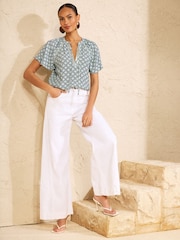 Love & Roses Mint Green Geo Print Sequin Trim V-Neck Short Sleeve Blouse - Image 3 of 4