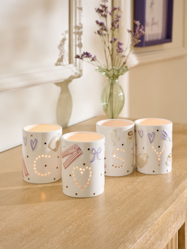 White Set of 4 Cosy Ceramic Tea Light Holders - Image 1 of 4 White Set of 4 Cosy Ceramic Tea Light Holders - Image 1 of 4