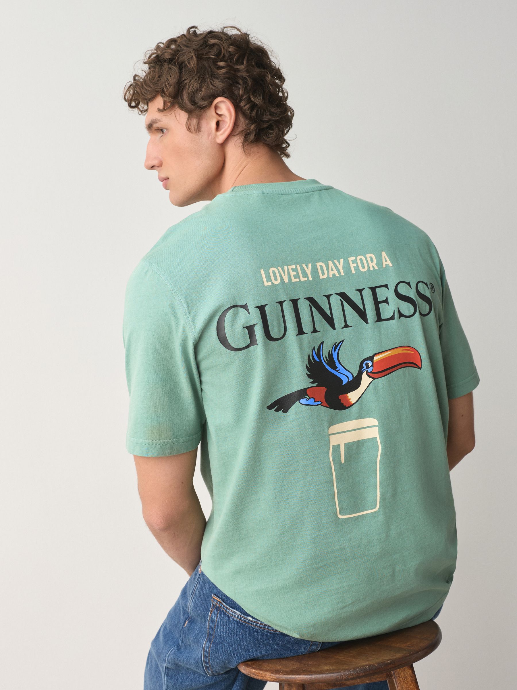 Buy Dark Green Guinness Relaxed Fit T-Shirt from the Next UK