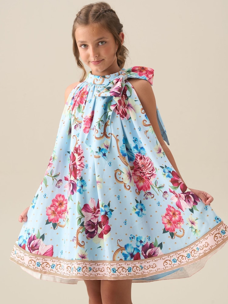 blue and white swing dress Joleen White Animal Print In Blue Midi Dress – Nimisski
