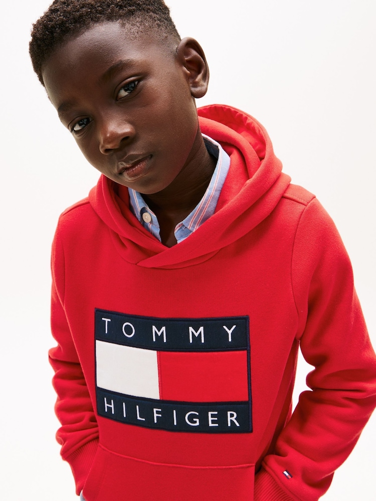 Tommy Hilfiger Red Heritage Flag Badge Terry Hoodie - Image 1 of 5 Tommy Hilfiger Red Heritage Flag Badge Terry Hoodie - Image 1 of 5