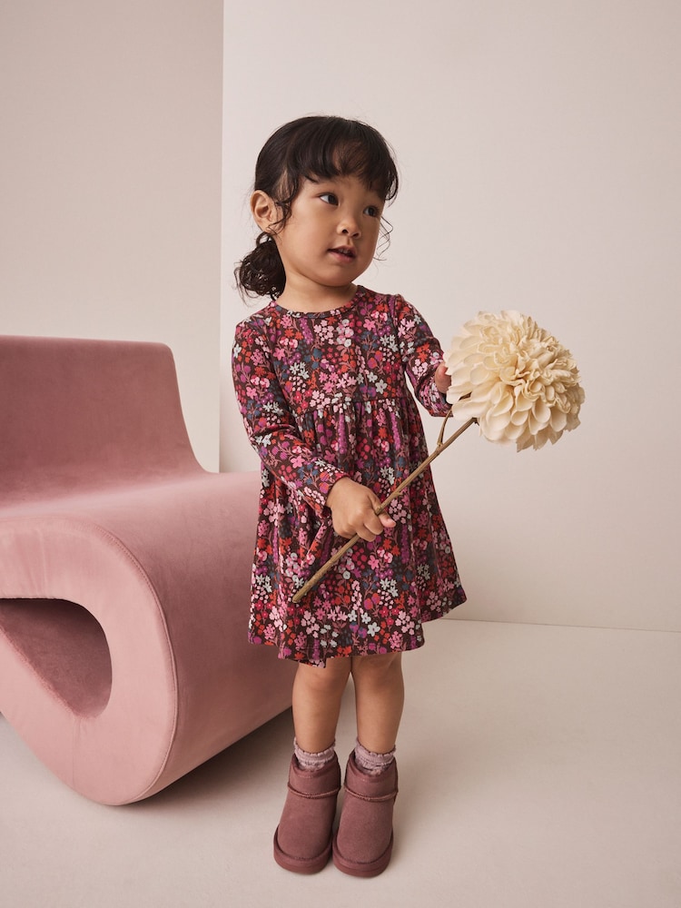 Burgundy Red Ditsy Floral Long Sleeve Ribbed Dress (3mths-7yrs) - Image 1 of 8 Burgundy Red Ditsy Floral Long Sleeve Ribbed Dress (3mths-7yrs) - Image 1 of 8