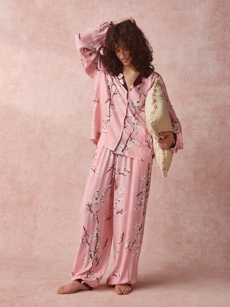 Bath & Body Works Pink Japanese Cherry Blossom Long Sleeve Button Through Pyjamas - Image 1 of 9 Bath & Body Works Pink Japanese Cherry Blossom Long Sleeve Button Through Pyjamas - Image 1 of 9