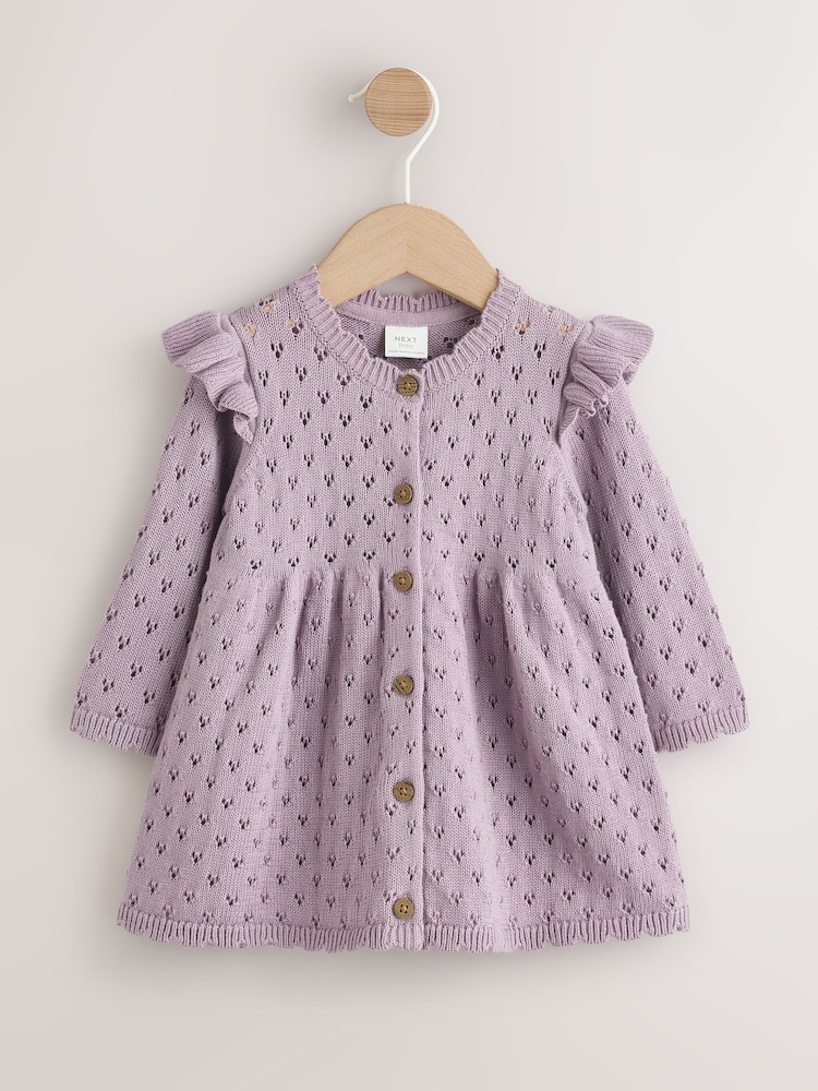 Lilac Purple Pointelle Knitted Frill Shoulder Baby Dress (0mths-2yrs) - Image 1 of 6 Lilac Purple Pointelle Knitted Frill Shoulder Baby Dress (0mths-2yrs) - Image 1 of 6
