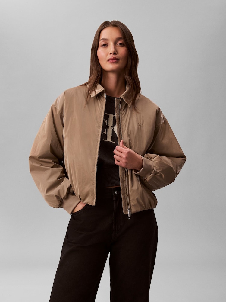 Calvin Klein Nude Shine Relaxed Bomber Jacket - Image 1 of 6 Calvin Klein Nude Shine Relaxed Bomber Jacket - Image 1 of 6