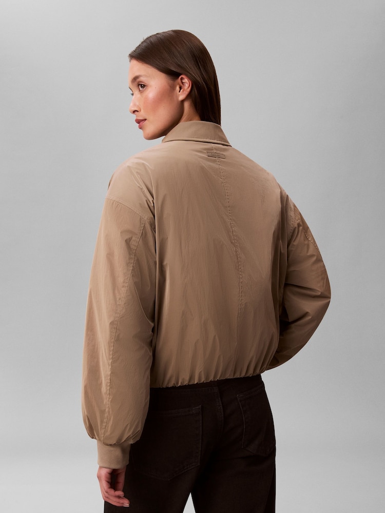 Calvin Klein Nude Shine Relaxed Bomber Jacket - Image 2 of 6 Calvin Klein Nude Shine Relaxed Bomber Jacket - Image 2 of 6