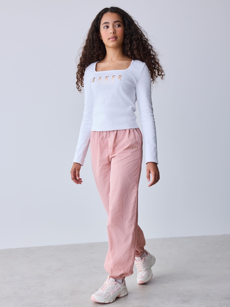 Baker by Ted Baker Pink 2 Piece Ribbed Top & Nylon Balloon Shape Trousers Set - Image 1 of 6 Baker by Ted Baker Pink 2 Piece Ribbed Top & Nylon Balloon Shape Trousers Set - Image 1 of 6