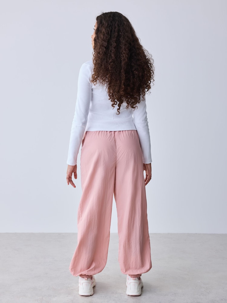 Baker by Ted Baker Pink 2 Piece Ribbed Top & Nylon Balloon Shape Trousers Set - Image 2 of 6 Baker by Ted Baker Pink 2 Piece Ribbed Top & Nylon Balloon Shape Trousers Set - Image 2 of 6
