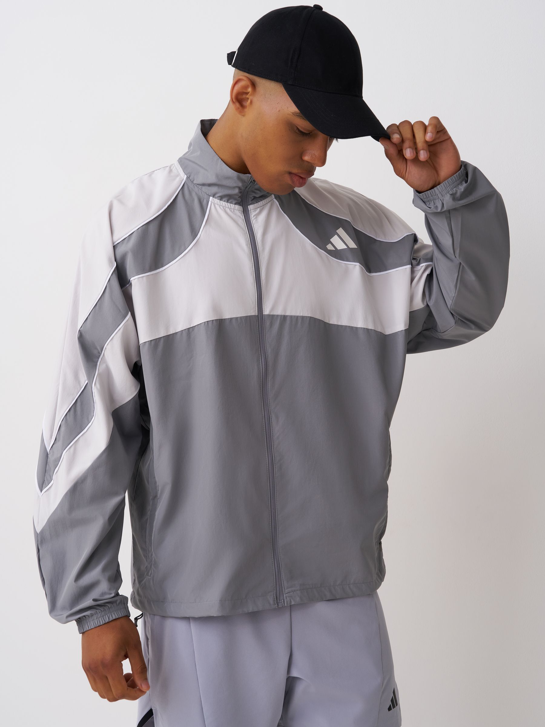 Comprar Cinza - Casaco de corrida adidas Adizero Archive from Next