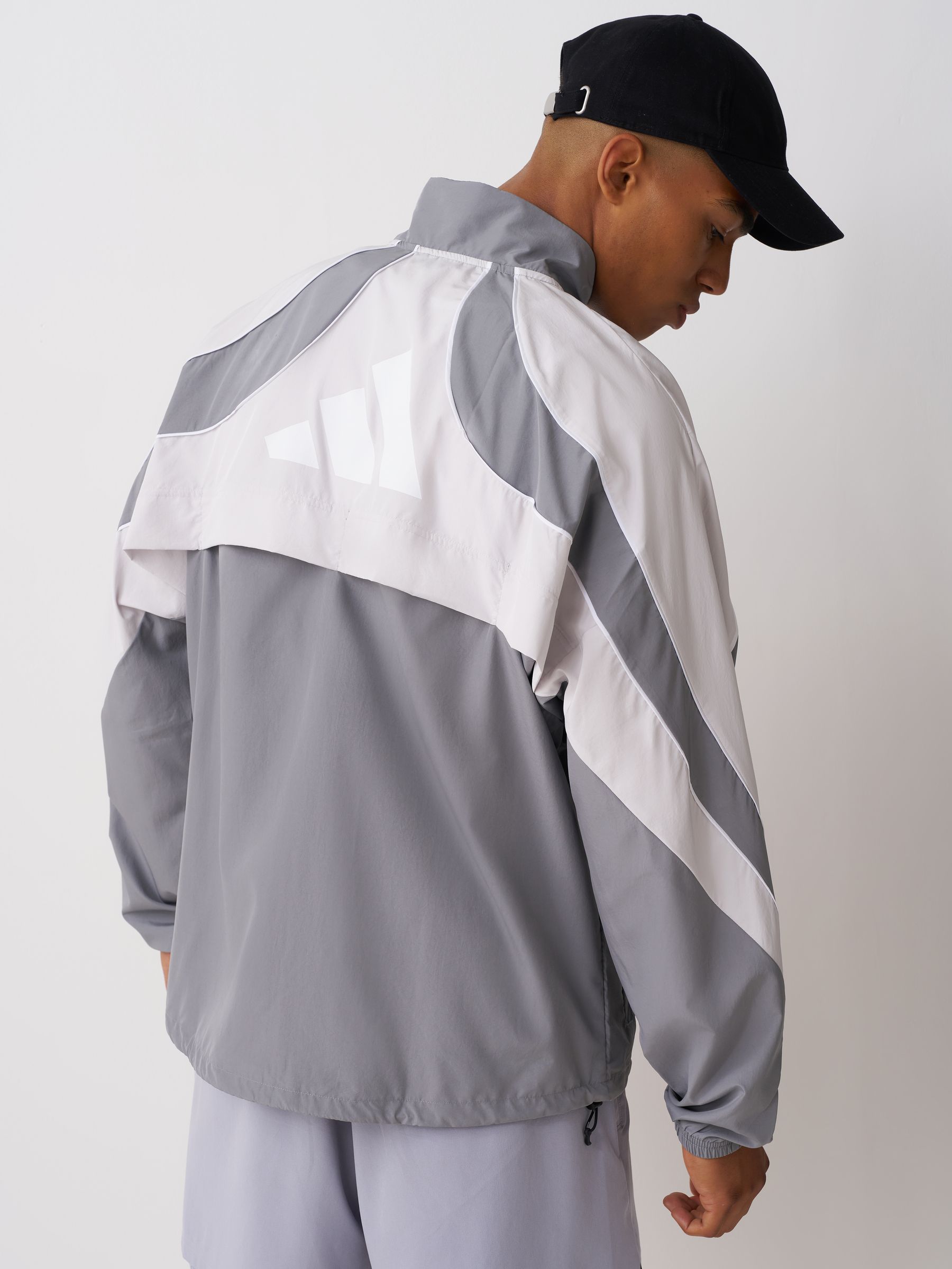 Comprar Cinza - Casaco de corrida adidas Adizero Archive from Next