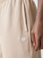 beis - Pantalones de chándal básicos con bajo abierto y trébol de Adidas Originals - Imagen 5 de 6