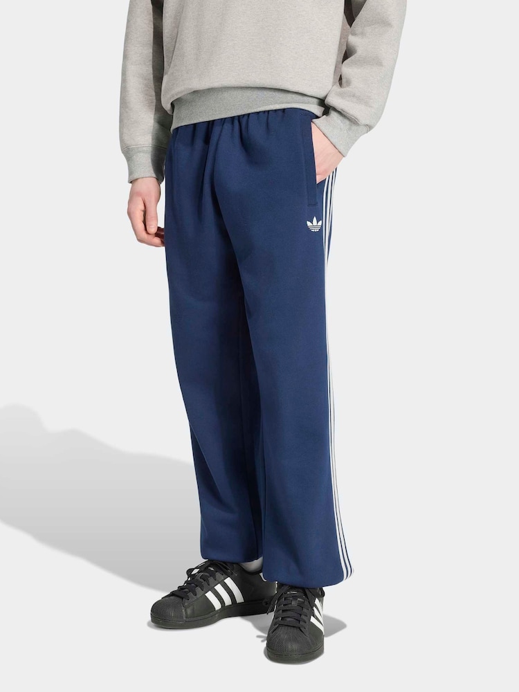 adidas Originals Blue Adicolor 3 Stripes Cuffed Sweatpants - Image 1 of 6
