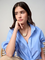 Aela Gold Tone Statement Conch Necklace - Image 1 of 3