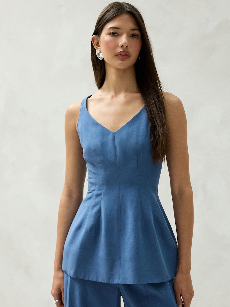 Blue Peplum V-Neck Top - Image 1 of 8 Blue Peplum V-Neck Top - Image 1 of 8