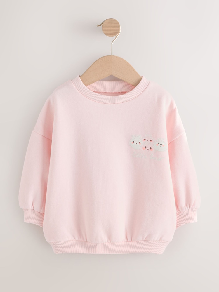 Light Pink Bao Buns Crew Neck Sweatshirt (3mths-7yrs) - Image 1 of 6 Light Pink Bao Buns Crew Neck Sweatshirt (3mths-7yrs) - Image 1 of 6
