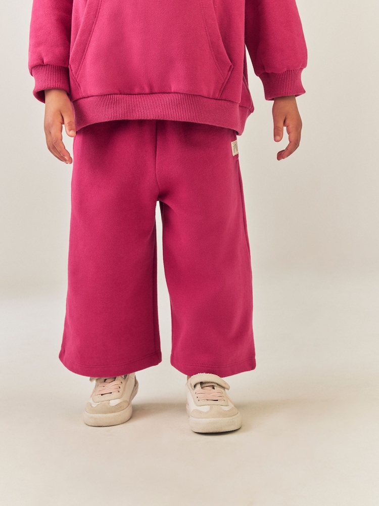 Berry Pink Wide Leg Sweat Joggers (3mths-7yrs) - Image 1 of 9 Berry Pink Wide Leg Sweat Joggers (3mths-7yrs) - Image 1 of 9