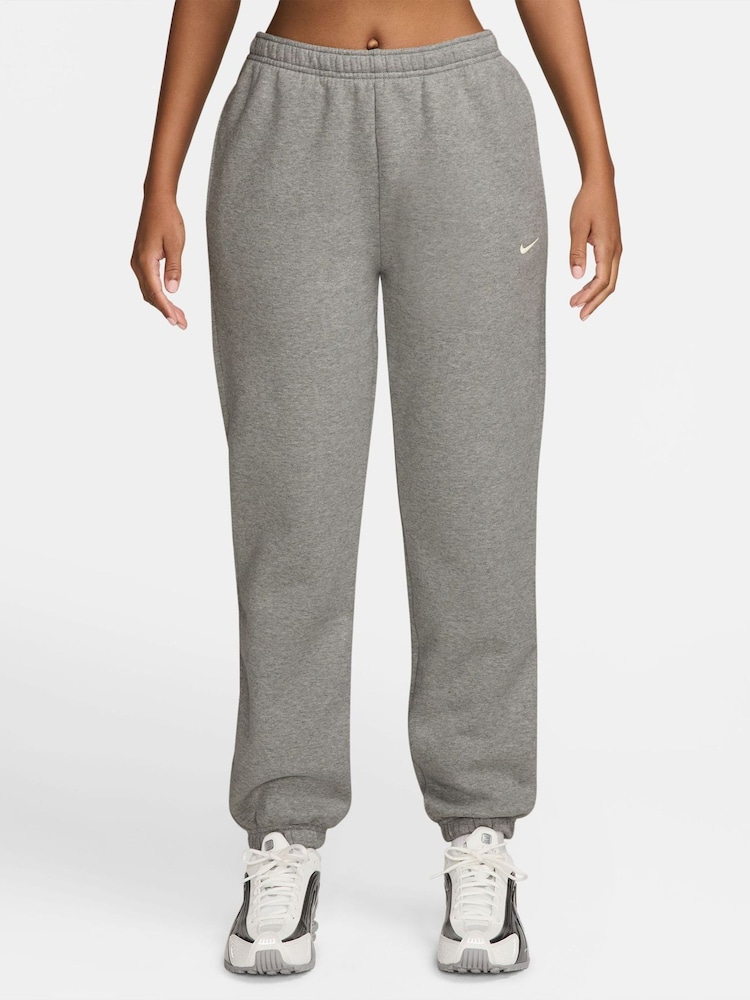 Nike Grey Heather Studio Fleece Mid Rise Cuffed Joggers - Image 1 of 3 Nike Grey Heather Studio Fleece Mid Rise Cuffed Joggers - Image 1 of 3