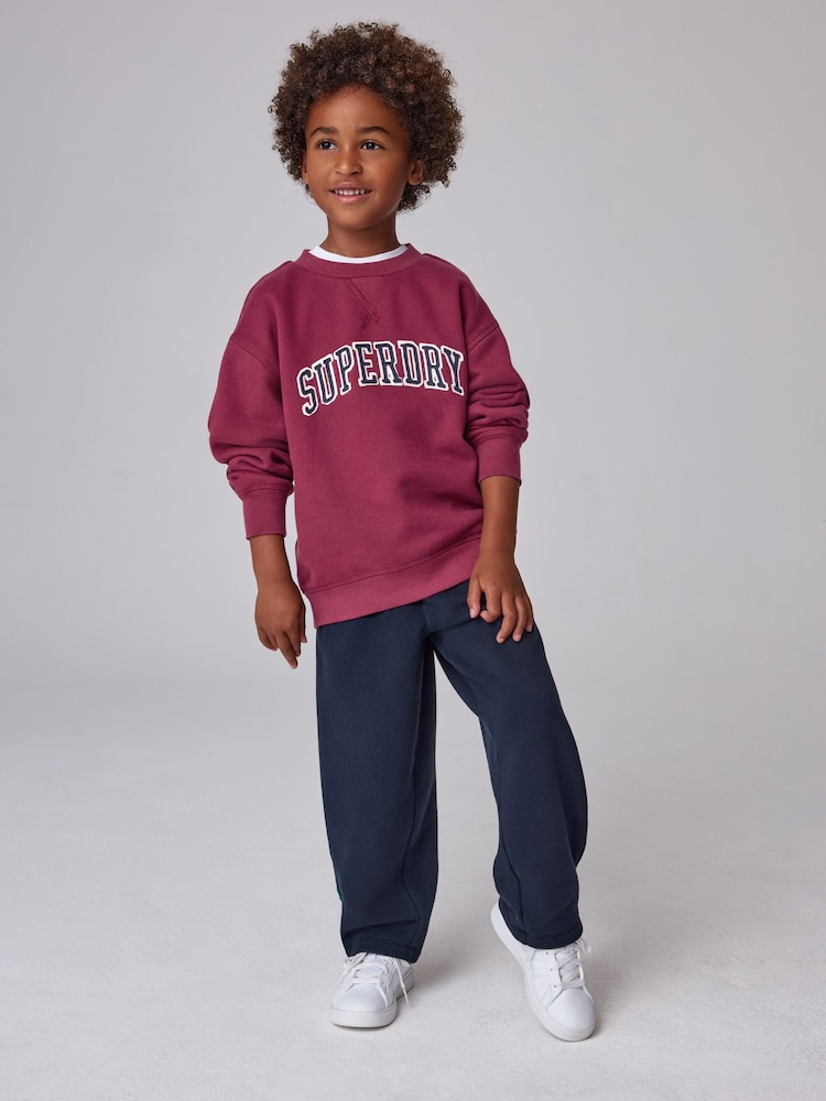 Superdry Red/Navy Graphic Sweatshirt and Joggers Set - Image 1 of 13 Superdry Red/Navy Graphic Sweatshirt and Joggers Set - Image 1 of 13