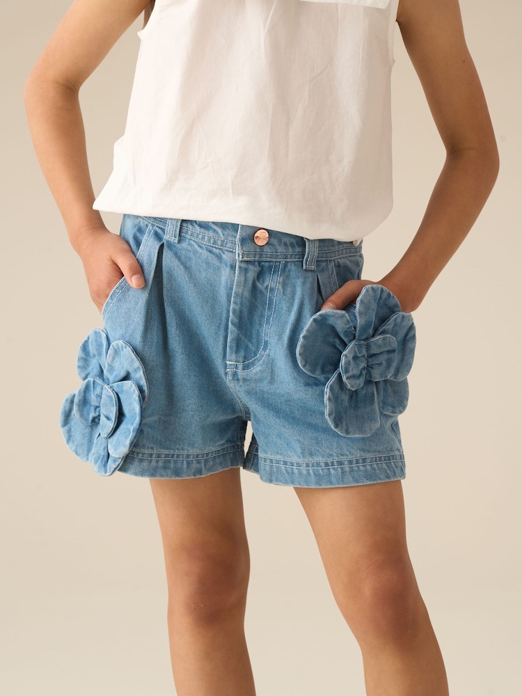 Angel & Rocket Blue Eden 3D Flower Denim Shorts - Image 1 of 7 Angel & Rocket Blue Eden 3D Flower Denim Shorts - Image 1 of 7