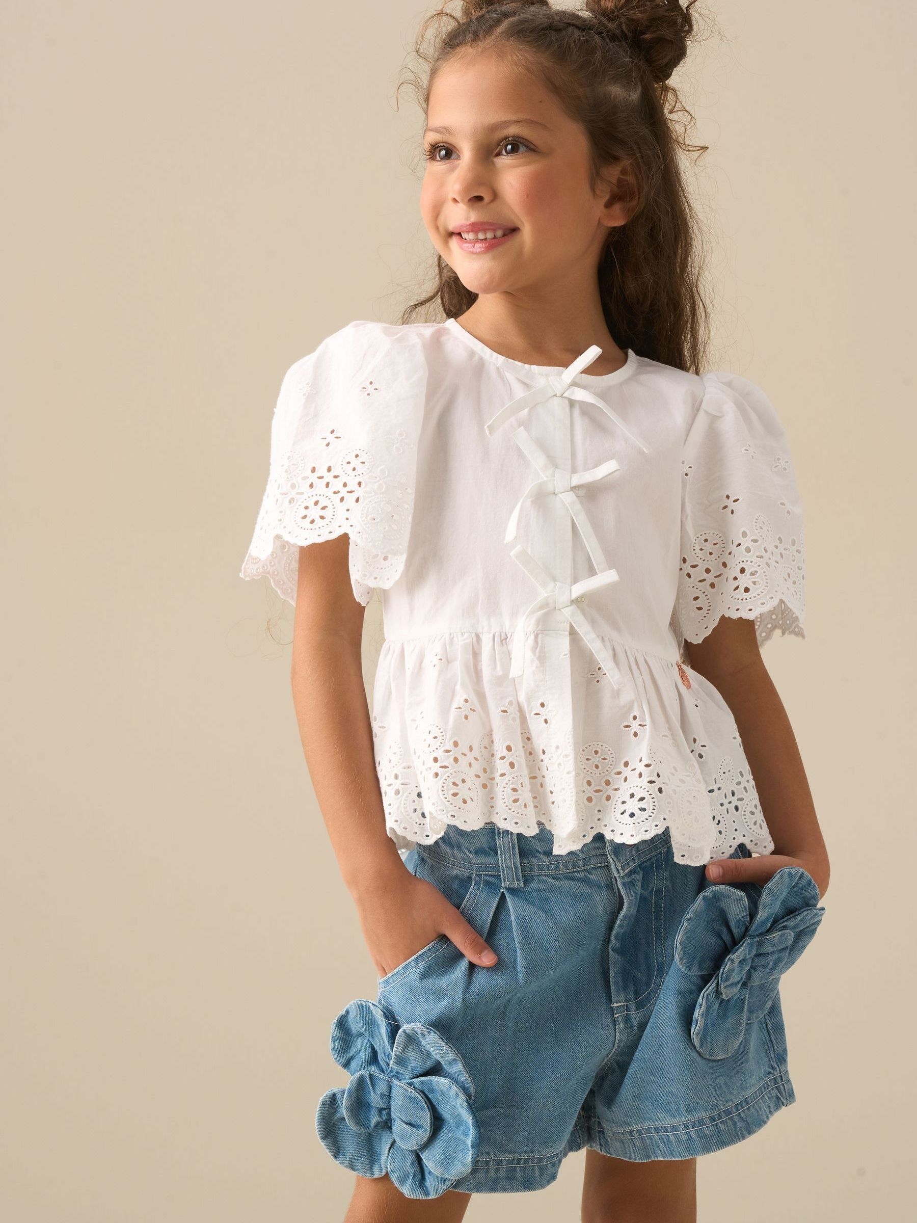 Buy Angel & Rocket White Ria Broderie Tie Front Peplum Blouse from