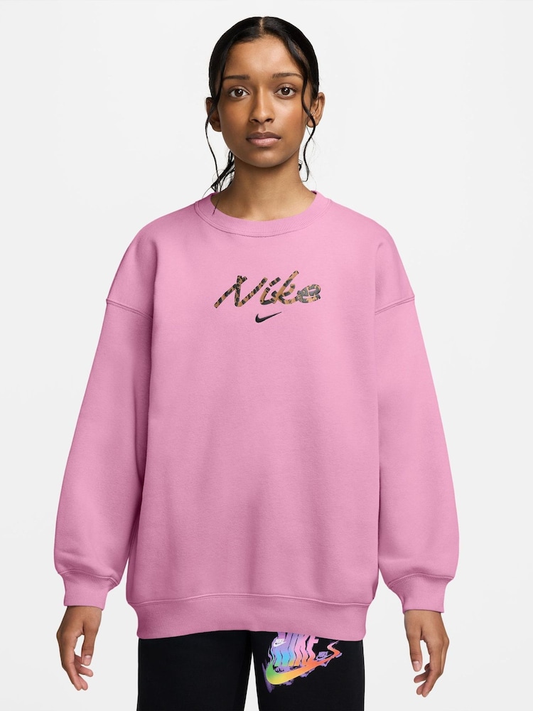 Nike Pink Rise Studio Fleece Oversized Crew Sweatshirt - Image 1 of 3 Nike Pink Rise Studio Fleece Oversized Crew Sweatshirt - Image 1 of 3