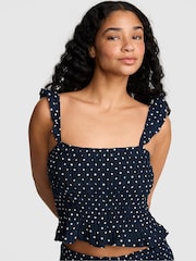 Victoria's Secret Pink Noir Navy Blue Polka Dot Smocked Ruffle Top - Image 1 of 2