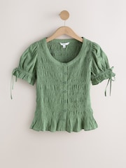 Green Smocked Peplum Short Sleeve Top - Image 1 of 3