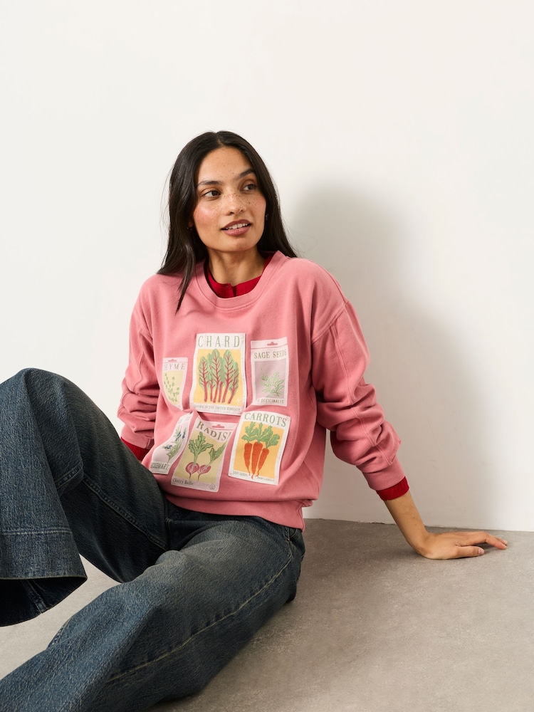 FatFace Alex Pink Seed Packet Graphic Crew Sweat Top - Image 1 of 6 FatFace Alex Pink Seed Packet Graphic Crew Sweat Top - Image 1 of 6