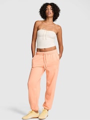 Victoria's Secret PINK Peach Tree Orange Cuffed Fleece Joggers - Image 1 of 2
