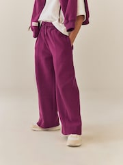 Rosa ciruela - Pantalones de chándal de pierna ancha (3-16 años) - Imagen 1 de 4