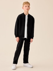 Czarny z tkaniny interlock - Elegancka kurtka bomberka (3–16 lat) - Obraz 1 z 11