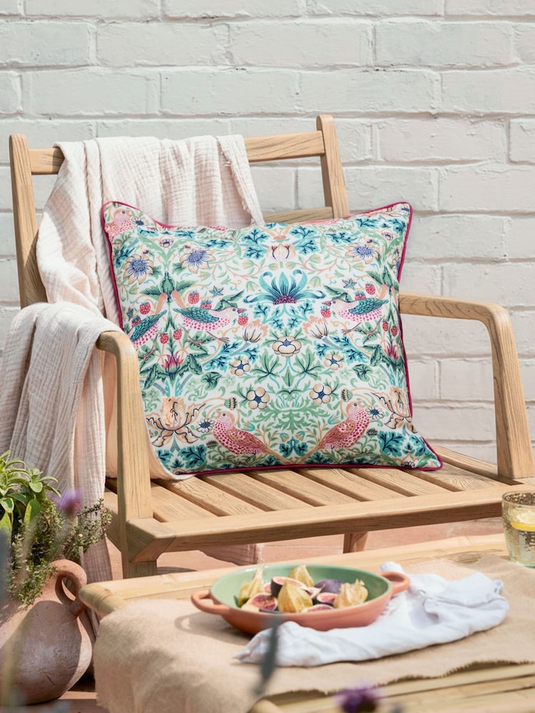 Morris & Co Coral Leaf Green Strawberry Thief Piped Outdoor Cushion - Image 1 of 6