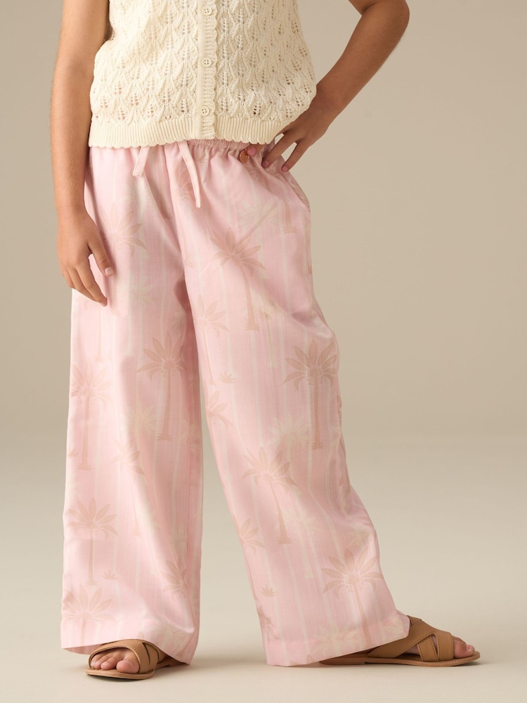 Angel & Rocket Pink Sarah Palm Print Tie Waist Trousers - Image 1 of 5 Angel & Rocket Pink Sarah Palm Print Tie Waist Trousers - Image 1 of 5