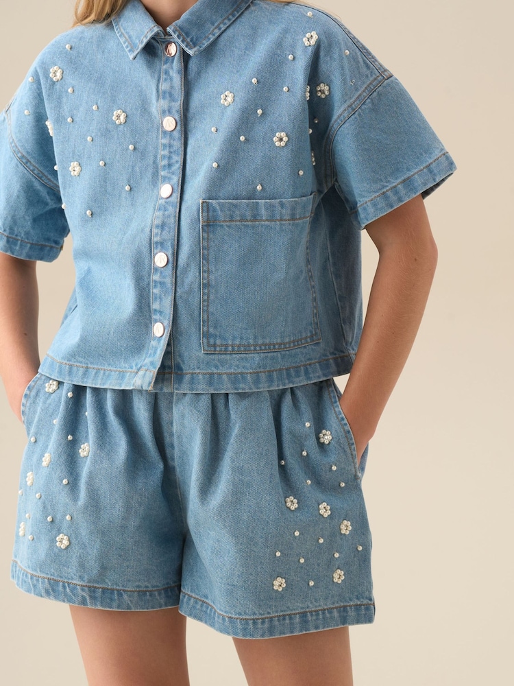 Angel & Rocket Blue Zeta Embellished Denim Shorts - Image 1 of 7 Angel & Rocket Blue Zeta Embellished Denim Shorts - Image 1 of 7