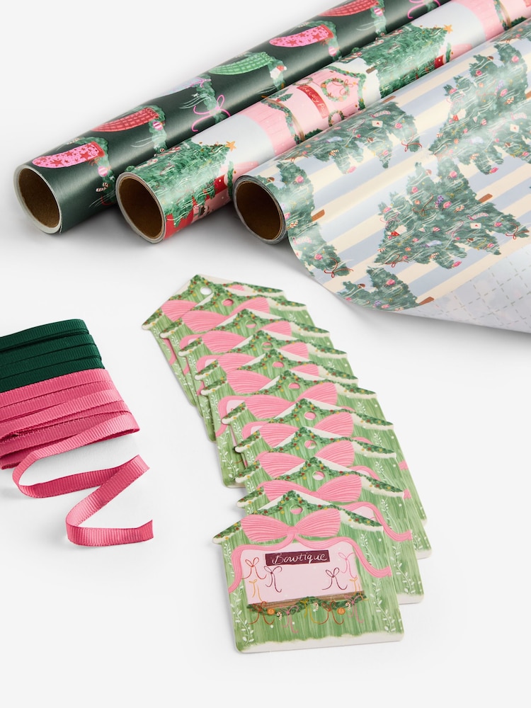 Set of 3 Pink and Green Market Scene Christmas Wrapping Paper Set of 3, 3m Gift Tags and Ribbons Set - Image 1 of 2 Set of 3 Pink and Green Market Scene Christmas Wrapping Paper Set of 3, 3m Gift Tags and Ribbons Set - Image 1 of 2