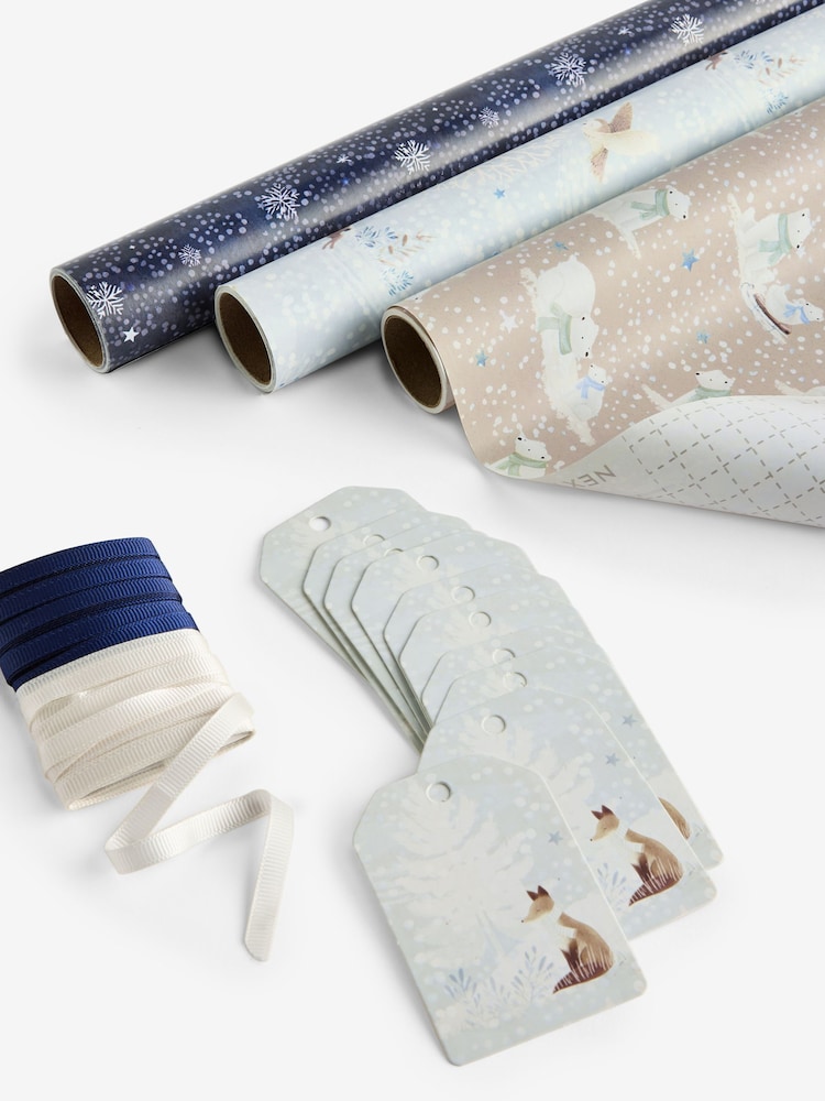 Set of 3 Blue and White Winter Wood Christmas Wrapping Paper Set of 3, 3m Gift Tags and Ribbons Set - Image 1 of 2 Set of 3 Blue and White Winter Wood Christmas Wrapping Paper Set of 3, 3m Gift Tags and Ribbons Set - Image 1 of 2