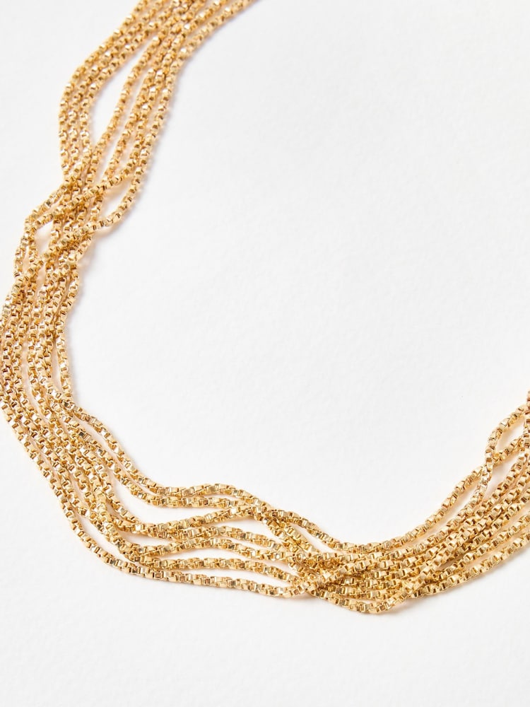 Oliver Bonas Gold Tone Jillian Multi Chain Statement Bow Layered Necklace - Image 4 of 4 Oliver Bonas Gold Tone Jillian Multi Chain Statement Bow Layered Necklace - Image 4 of 4