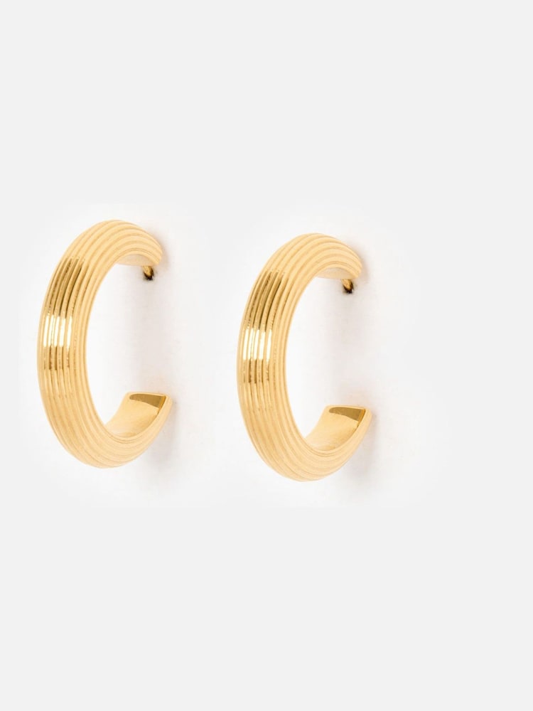 Oliver Bonas Gold Tone Stainless Steel Waterproof Line Chunky Hoop Earrings - Image 1 of 5 Oliver Bonas Gold Tone Stainless Steel Waterproof Line Chunky Hoop Earrings - Image 1 of 5