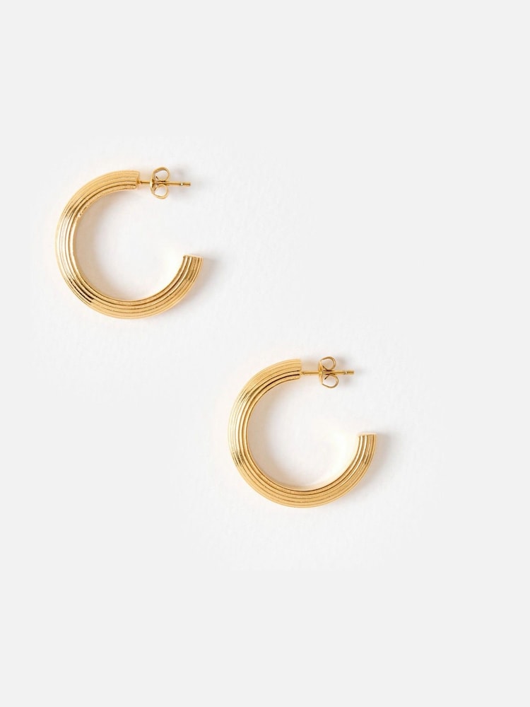 Oliver Bonas Gold Tone Stainless Steel Waterproof Line Chunky Hoop Earrings - Image 2 of 5 Oliver Bonas Gold Tone Stainless Steel Waterproof Line Chunky Hoop Earrings - Image 2 of 5