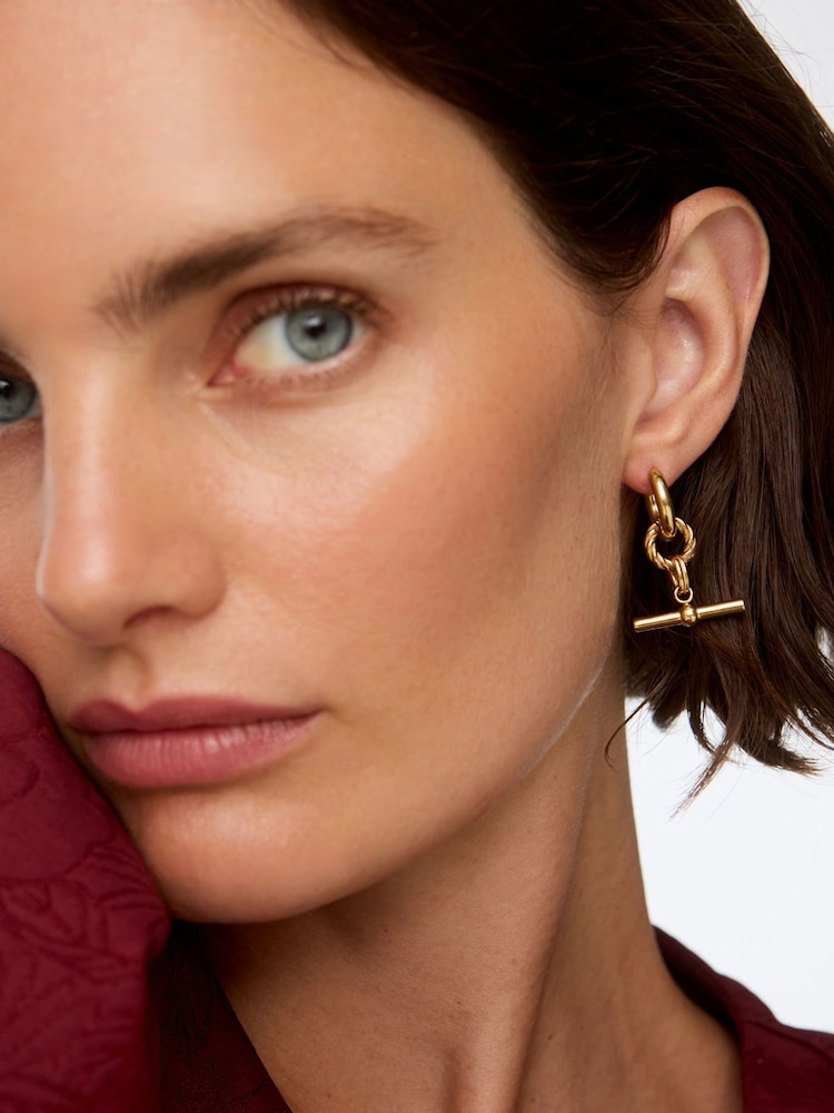 Oliver Bonas Gold Tone Stainless Steel Waterproof T-Bar Drop Hoop Earrings - Image 5 of 5 Oliver Bonas Gold Tone Stainless Steel Waterproof T-Bar Drop Hoop Earrings - Image 5 of 5