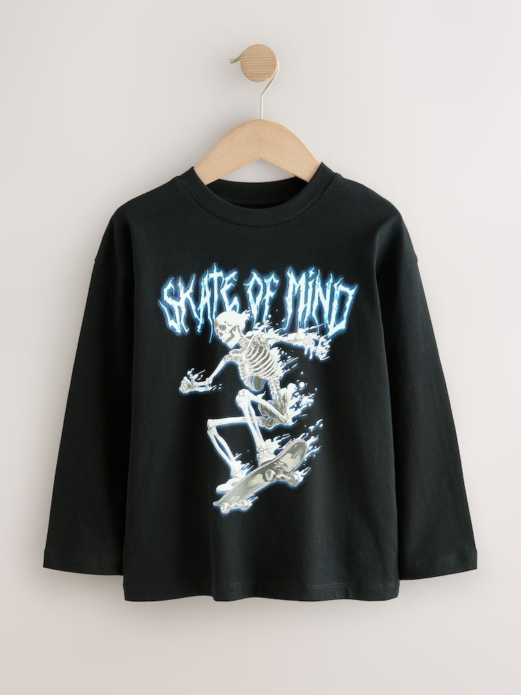 Black Skeleton Relaxed Fit Graphic Long Sleeve Cotton T-Shirt (3-16yrs) - Image 1 of 4 Black Skeleton Relaxed Fit Graphic Long Sleeve Cotton T-Shirt (3-16yrs) - Image 1 of 4